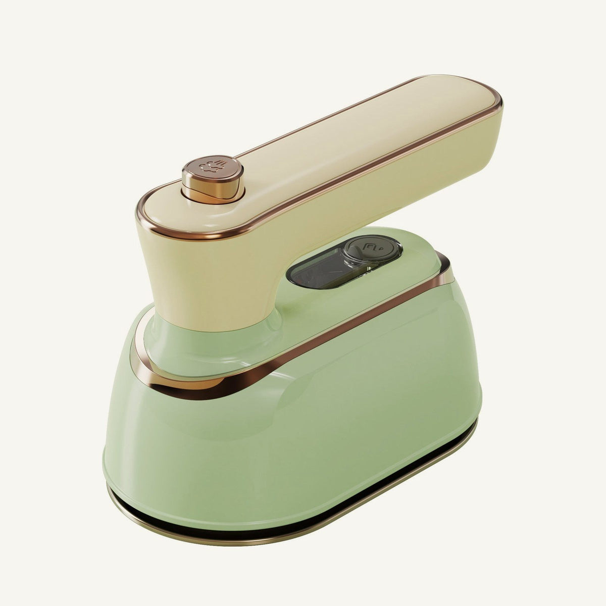 Lisvelle Mini Steam Iron in Sage: pale green body, cream handle, fine gold trim